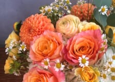 Flower arrangement with seasonal blooms